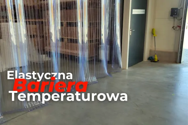 Elastyczna bariera temperaturowa z pasów PCV w przejściu magazynu